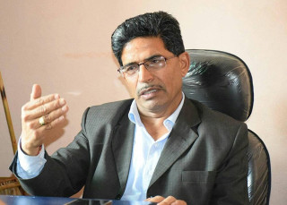 ओलीले गुरुङले दिएको जग्गा फिर्ता गर्नुपर्छ, यसमा स्वार्थ देखियो: अर्थविद् डा. अधिकारी
